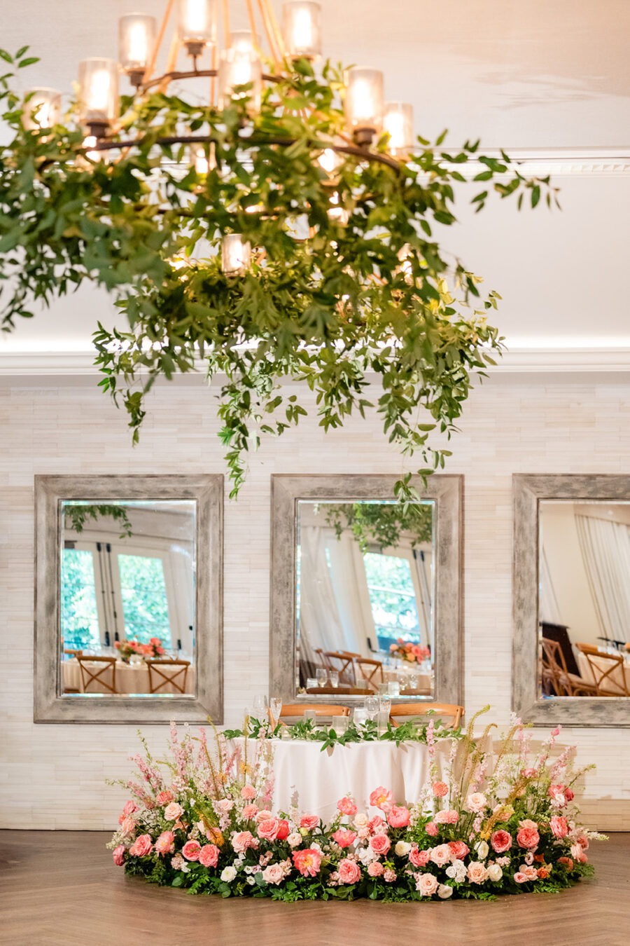 Sweetheart table inside a ballroom at Estancia La Jolla