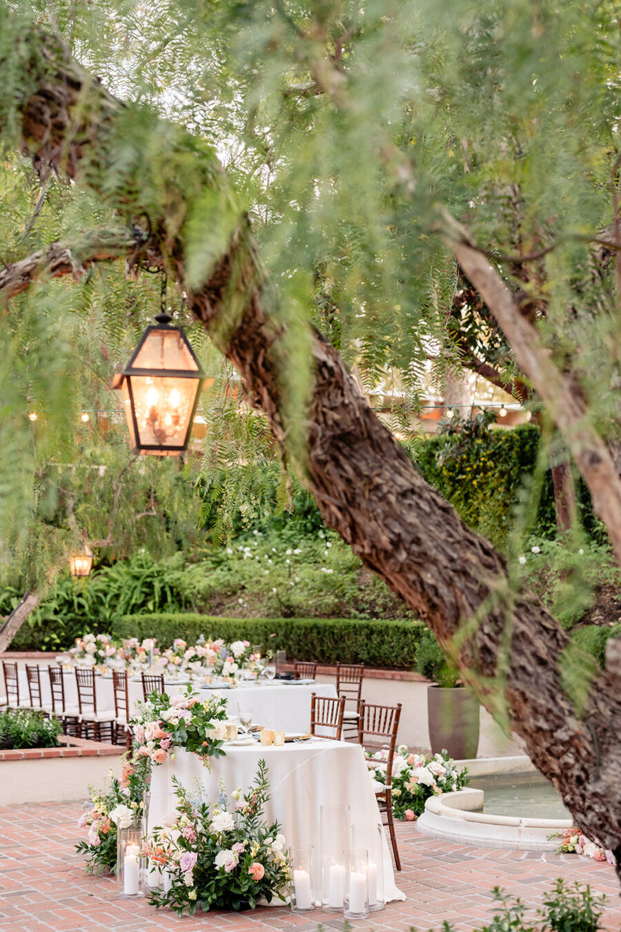 Reception site and sweetheart table at Santiago Courtyard at Rancho Bernardo Inn Wedding Venue in San Diego.