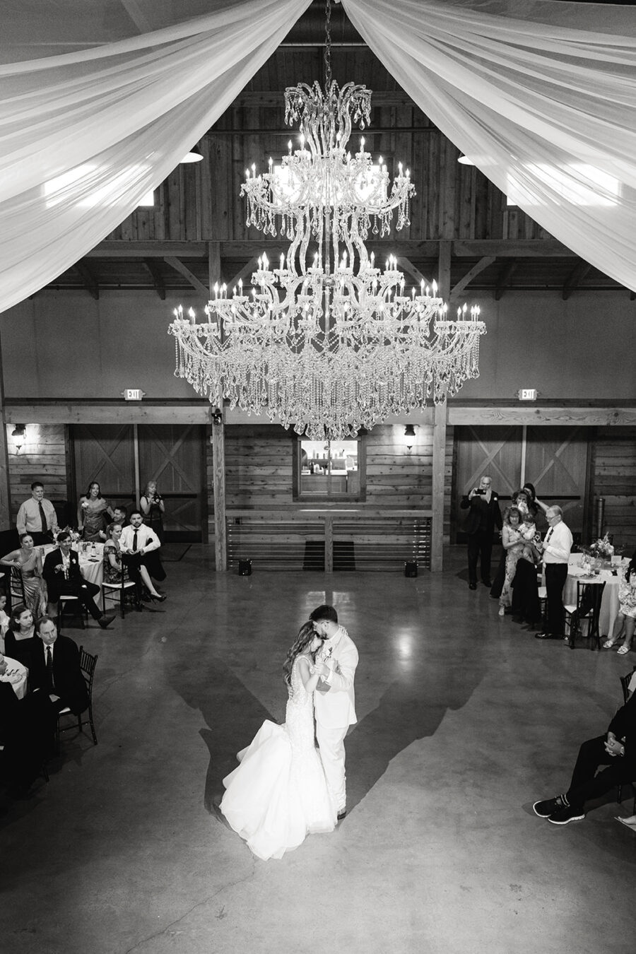 bride and groom during their first dance at their wedding reception at sycamore farms